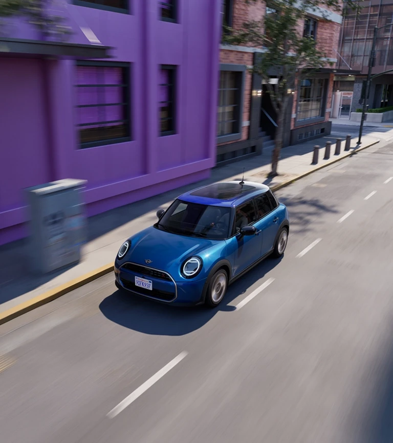 MINI Cooper 5 door – vista laterale – Icy Sunshine 